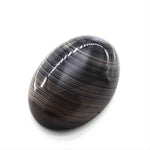 Load image into Gallery viewer, 12.3Ct Natural Black and Grey Sulemani Hakik Oval Gemstone
