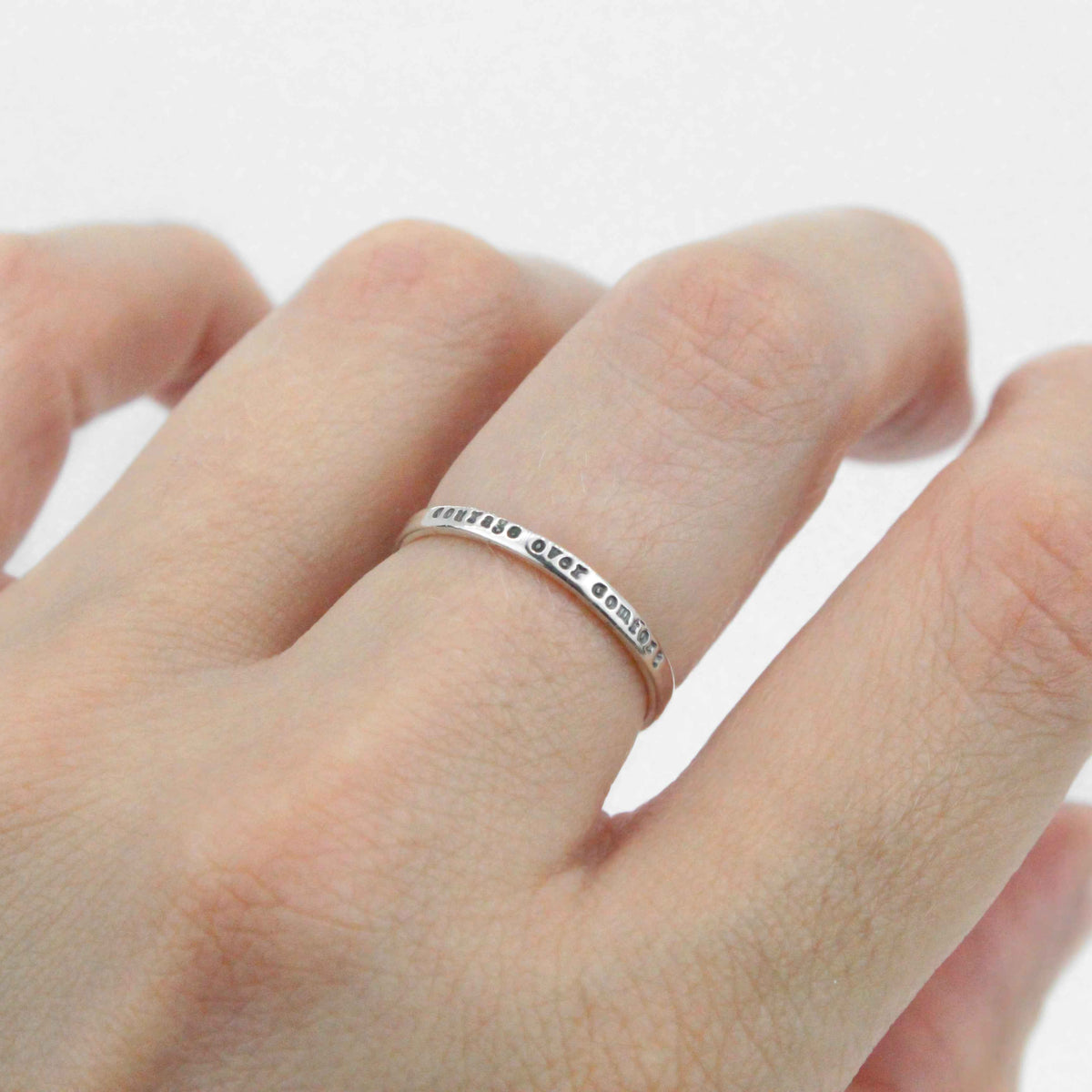 Courage over comfort tiny message ring in sterling silver