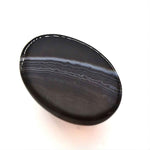 Load image into Gallery viewer, 12.4Ct Natural Black and Grey Sulemani Hakik Oval Gemstone
