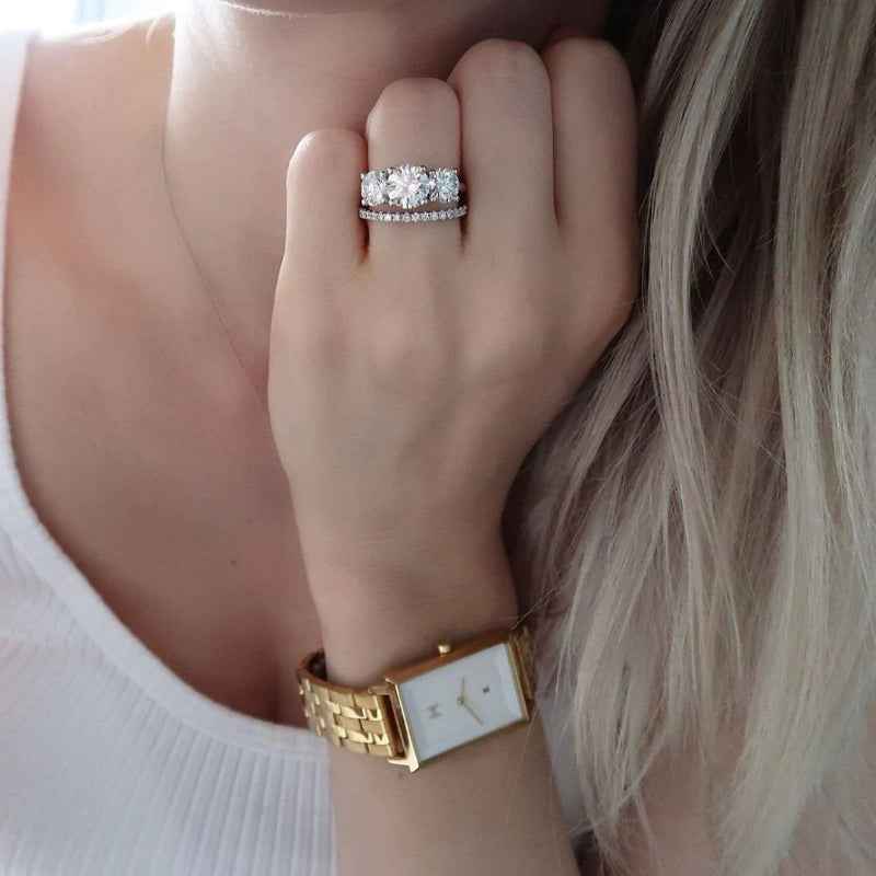 A dozen diamond silver ring set