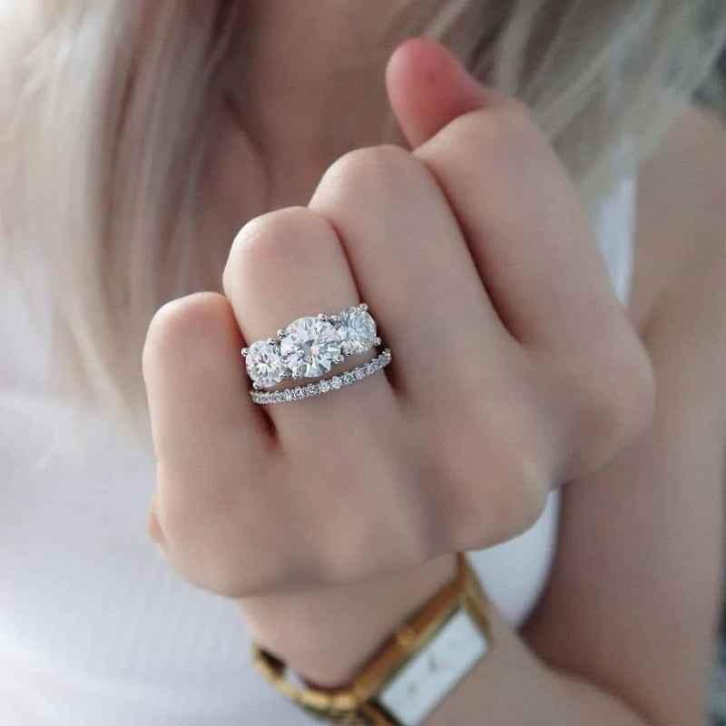 A dozen diamond silver ring set