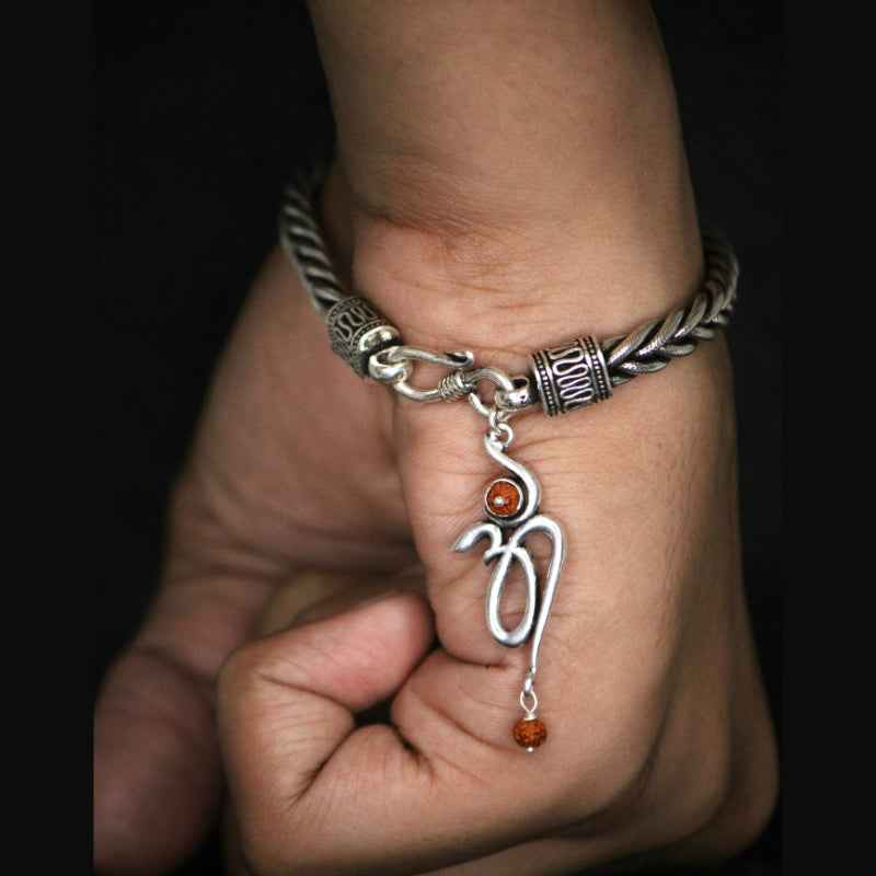 Stylish silver bracelet with om rudraksha pendent