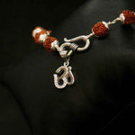 Load image into Gallery viewer, Silver Om Rudraksha Bracelet
