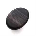 Load image into Gallery viewer, 12.8Ct Natural Black and Grey Sulemani Hakik Oval Gemstone
