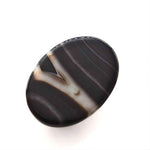 Load image into Gallery viewer, 12.5Ct Natural Black and Grey Sulemani Hakik Oval Gemstone
