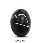 Load image into Gallery viewer, 12.4Ct Natural Black and Grey Sulemani Hakik Oval Gemstone
