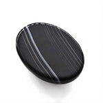 Load image into Gallery viewer, 12.9Ct Natural Black and Grey Sulemani Hakik Oval Gemstone
